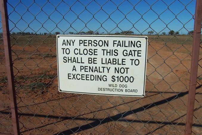 Sign on gate leaving Quinyambie Station entering NSW.