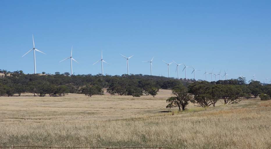 A line of wind turbines, passed en route to the point