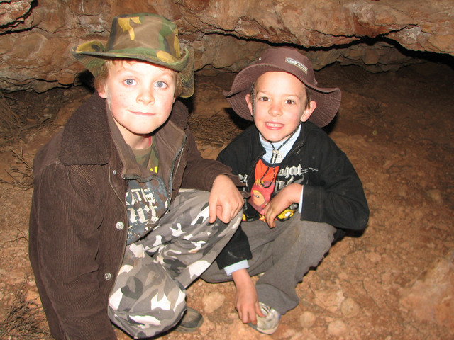 James & Tommy exploring a cave