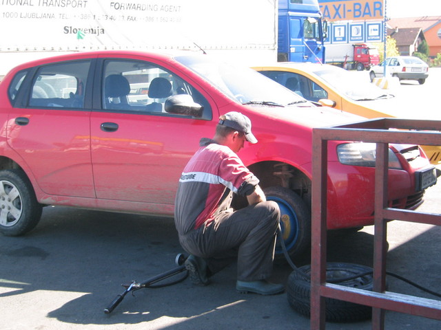 Getting my tire replaced at the Taxi-Bar