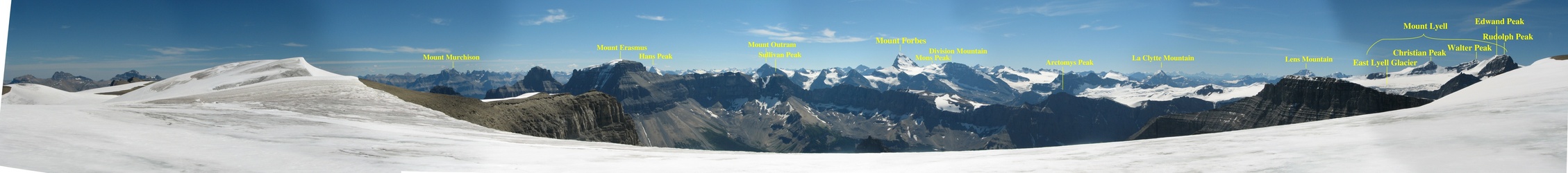 Taken 50 meters south of the confluence, at the top of the ridge looking south at centre, east on the left and west on the right.  Mount Forbes dominates the skyline.