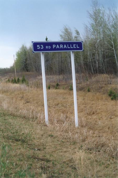 53 RD parallel sign along highway