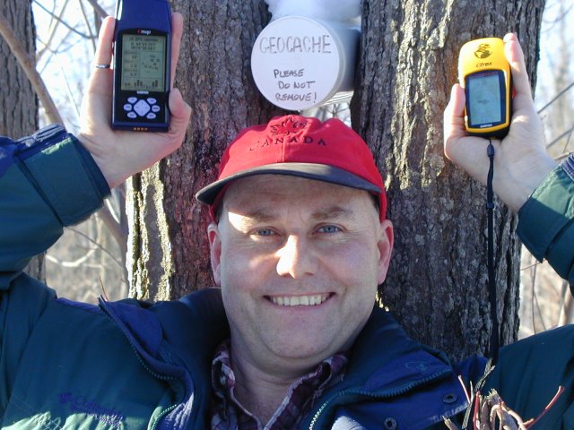 Steve with both GPS's and geocache