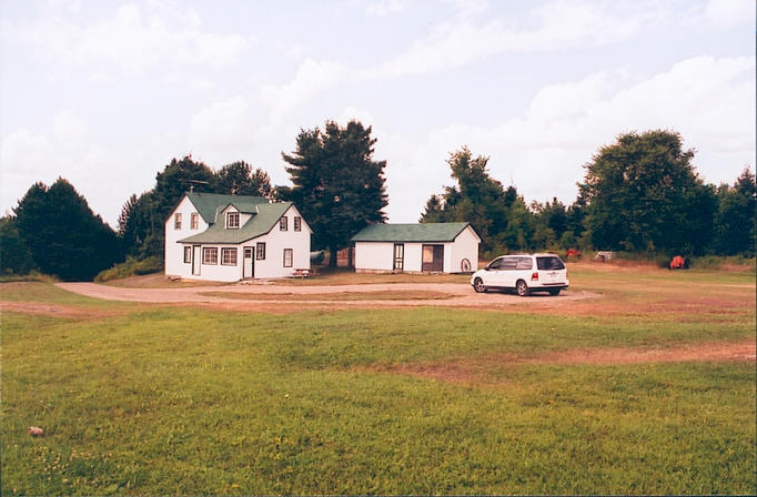 Cottage at end of lumber road.