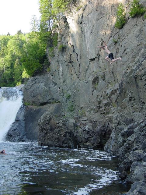 Michipicoten high school kids diving near Silver Falls.