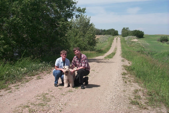 The three of us posed on the road leading to 51°N.  There is a pond directly behind the trees to the left of the picture.