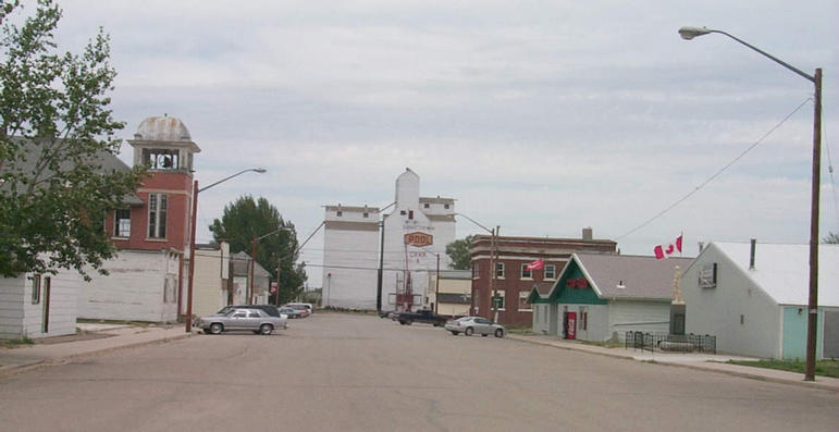 Main Street in the town of Craik. The building on the left with the bell tower is dated 1913.