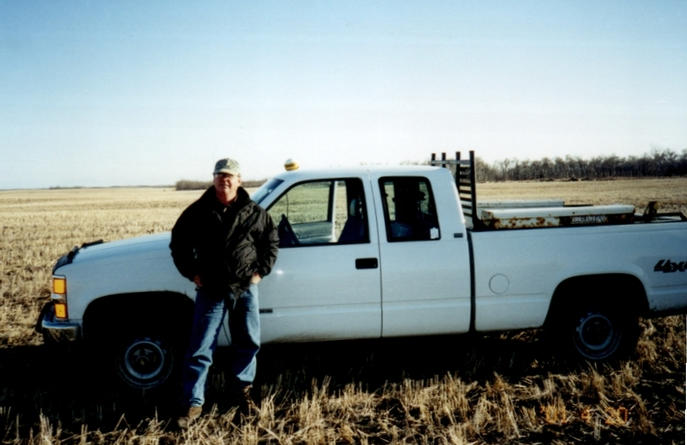 Rick, standing next to the truck and the confluence