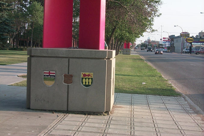The bases of the border markers with provincial and city shields.