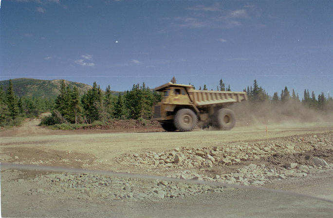 Construction site on the Alaska Highway, to the right and left of the road