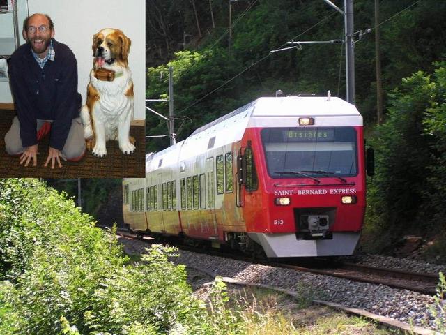 Train of the St. Bernard-Express and Dr. Werner with a Saint-Bernard dog