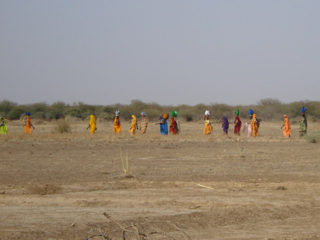 Women on a track between two villages