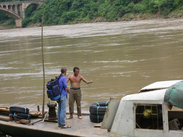 Targ consults the ferryman on the Běipán River in Yánjià Township.