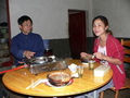 #3: Lǐ Qíjīn and Ah Feng at dinner.