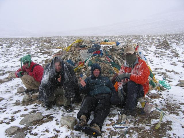 Suffering at Tibetan religious cairn Pass 2, Day 3. (left to right: Raz, Oren, Greg, Shay)