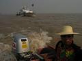 #3: View northwest, upstream. MSA boat and our raft pilot, He Jian Qiang.