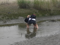 #6: Targ retrieving his thongs from the dirty, oily, sticky black muck