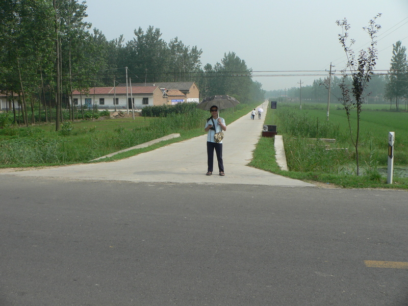 Ah Feng at the start of Húzhuāng Road