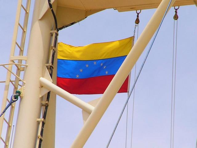 The Venezuelan courtesy flag hoisted
