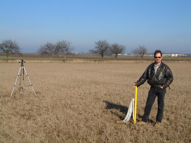 Difference of opinion!  Mark Pautz at the yellow stake marking the official confluence position.