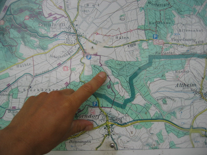Pointing to the Confluence at a Public Map of Trails