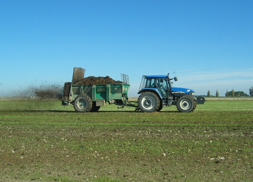 Farmer Putting Manure on his Fields