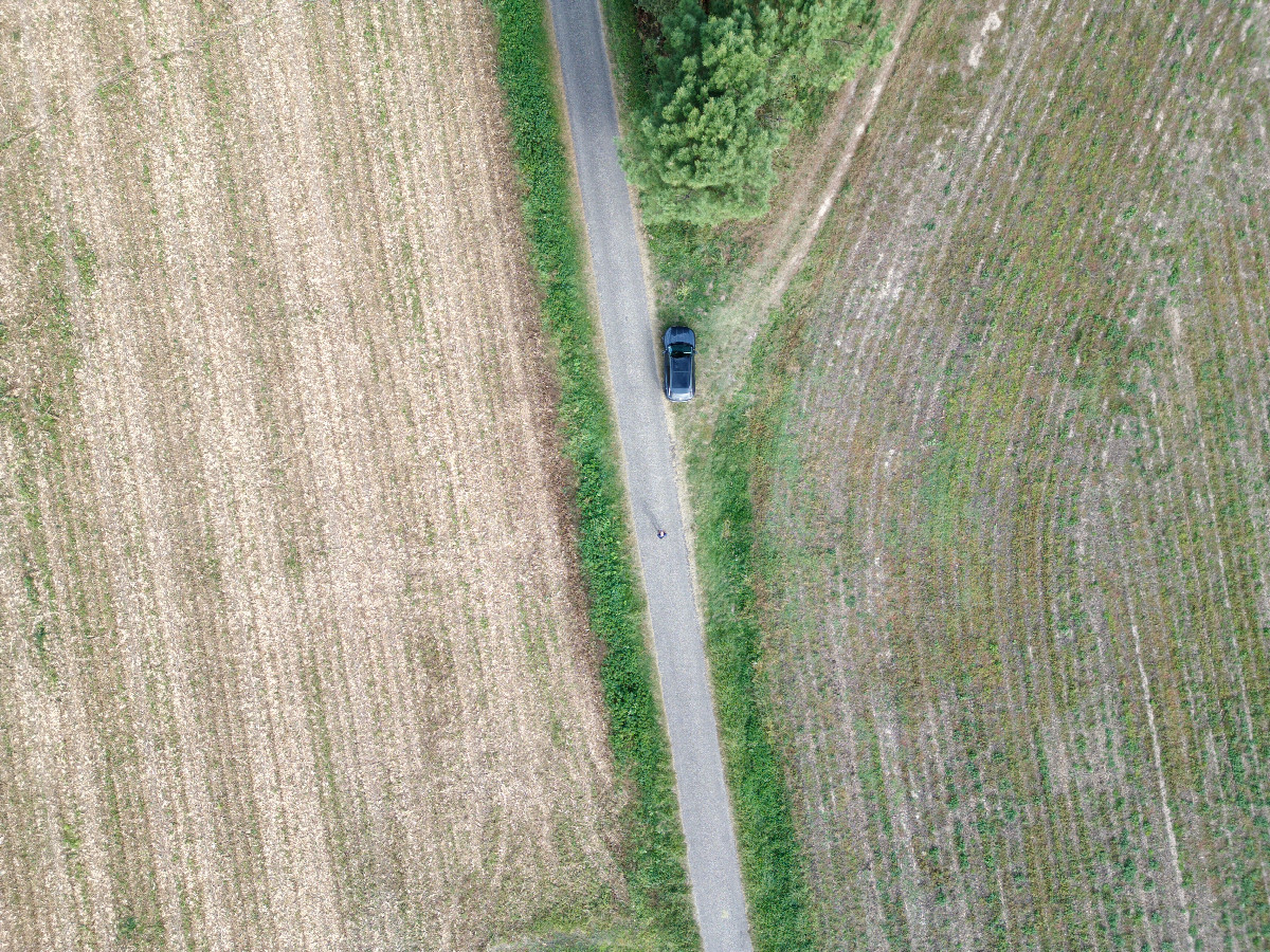 Looking down on the rural road (180m East of the point) from a height of 50m