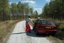 #7: Mirjam at the car park - the dirt road leads back to the water tower