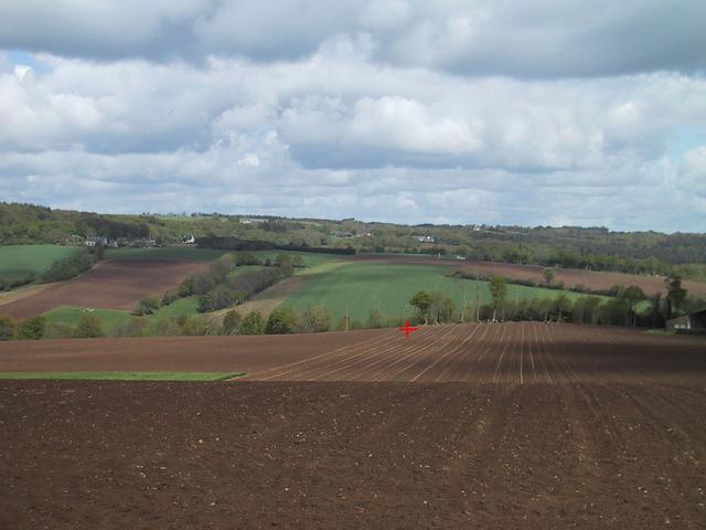 Looking north, from the D 188, towards the spot, showed by the red cross