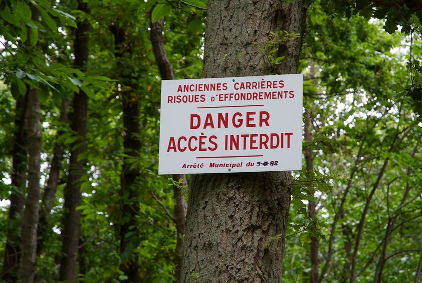 One of the many warning signs posted in the forest