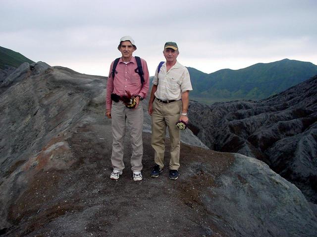 Laurent (left) and Guy (right) ready to throw flowers into the Bromo crater