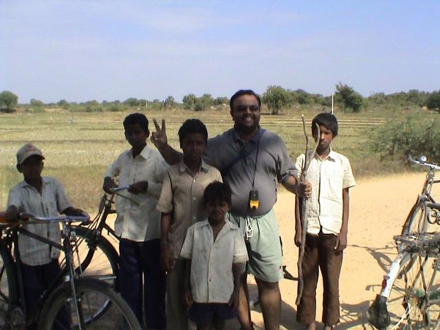 Praveen with locals near the confluence.