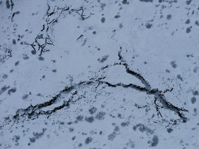 Aerial photo of snow covered lava fissures (7 Dec 2011)