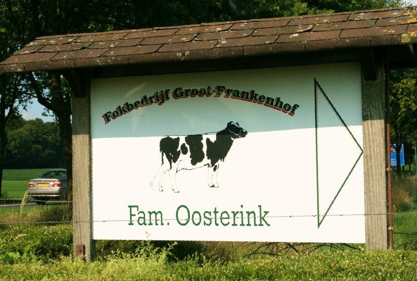 The sign at the entrance of the farm