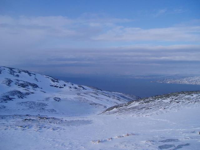 View looking north, along The Altafjord, the island Seiland in the horizon