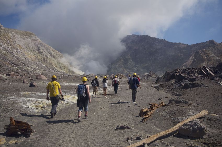 Touring volcanic White Island (with mandatory helmets and gas masks) nearby 