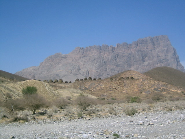 Ancient bee-hive tombs in front of Jabal Mišt