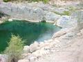 #4: A large pool with a waterfall near the village Wādiy al-`Arabiyyīn.