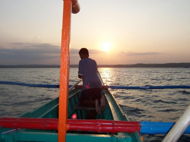 Leaving Cataingan at sunset on rented boat.