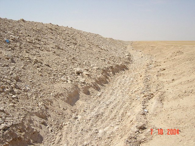 The ditch and the sand wall