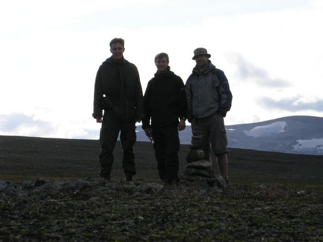 Confluence visitors, with cairn
