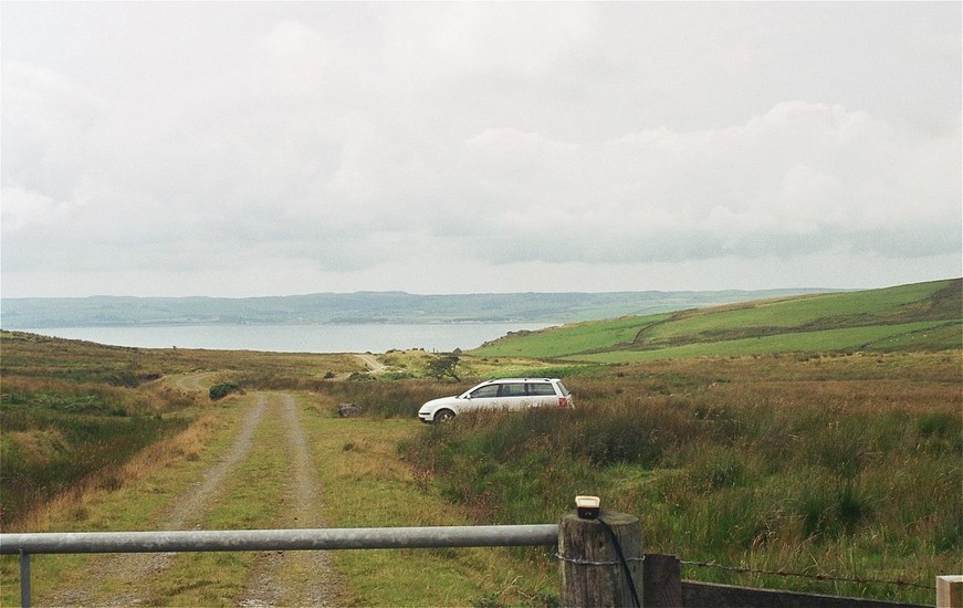 parking at the gate and overlooking Loch Ryan, 2.6 km south of the CP