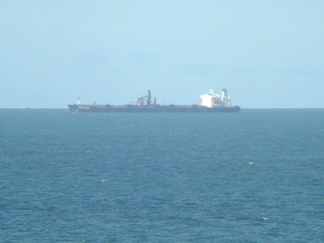 A tanker is loading crude oil for export