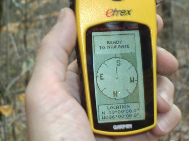 My GPS with the woods in the background