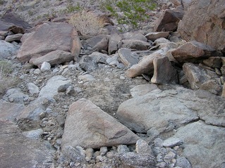 #1: The confluence point lies on this steep, rocky hillside, about 1000' above the surrounding desert