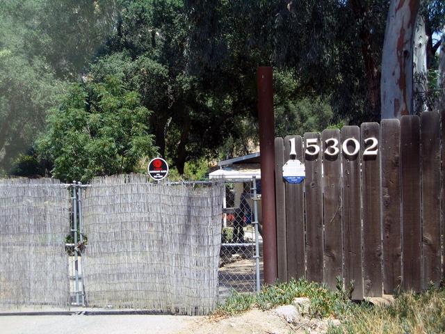 Locked gate across driveway on eastern side of confluence