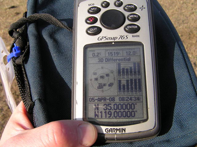 GPS reading at the confluence, under a wide open sky.  Notice that 12 satellites are being read!