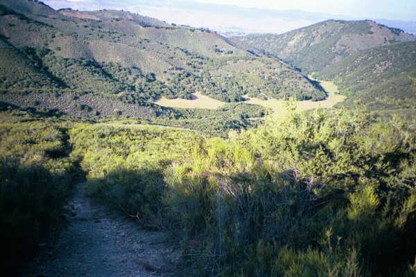 The trail leading down the ridgeline towards the confluence (which is in the center of this photo)