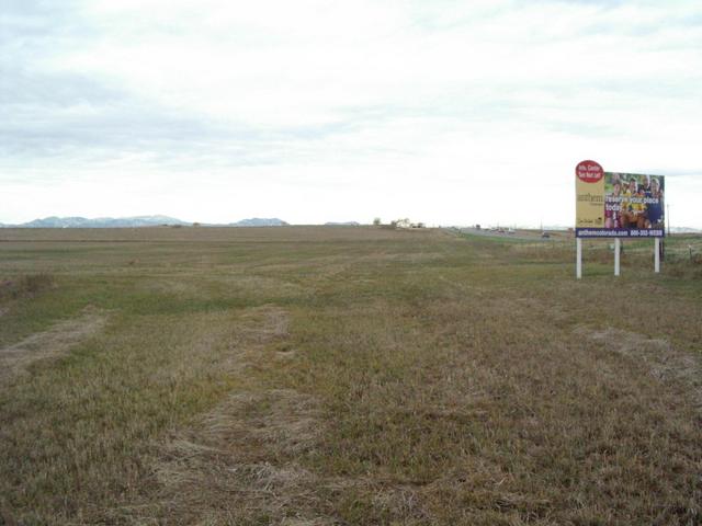 Looking west from N40 W105 with for sale sign