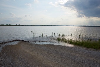 #1: Looking West towards the confluence point - 1.36 miles across currently-submerged Flinton Station Road